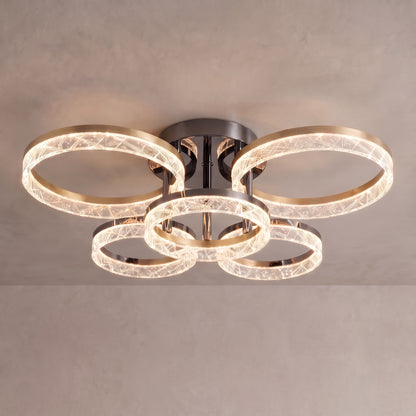 Corvina ceiling light close-up with 5 crystal-textured rings