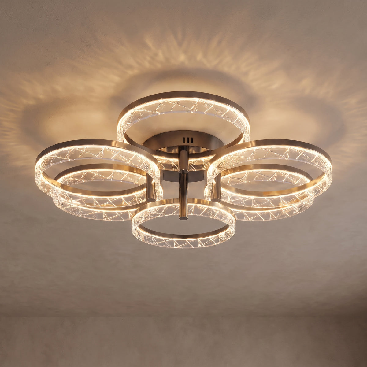 Corvina ceiling light close-up with 6 crystal-textured rings