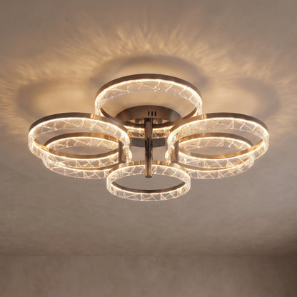 Corvina ceiling light close-up with 6 crystal-textured rings