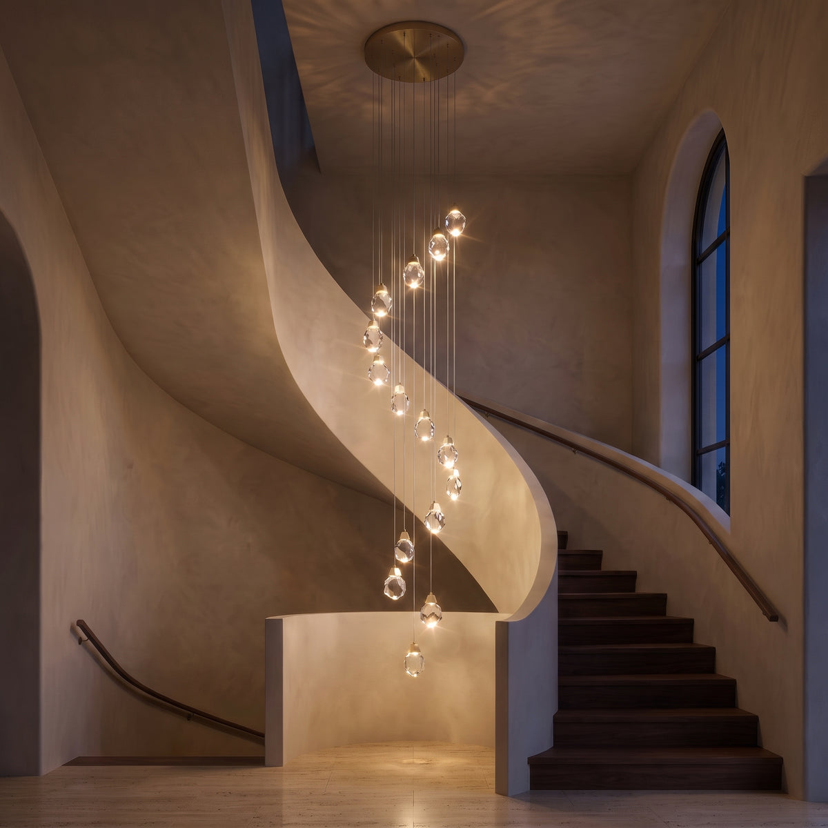 Alaric chandelier at night — lights on