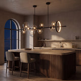Wren chandelier at night — lights on