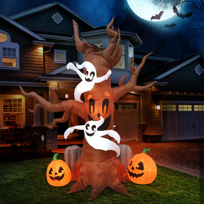 Pumpkin figure at the base of the inflatable Halloween scary tree