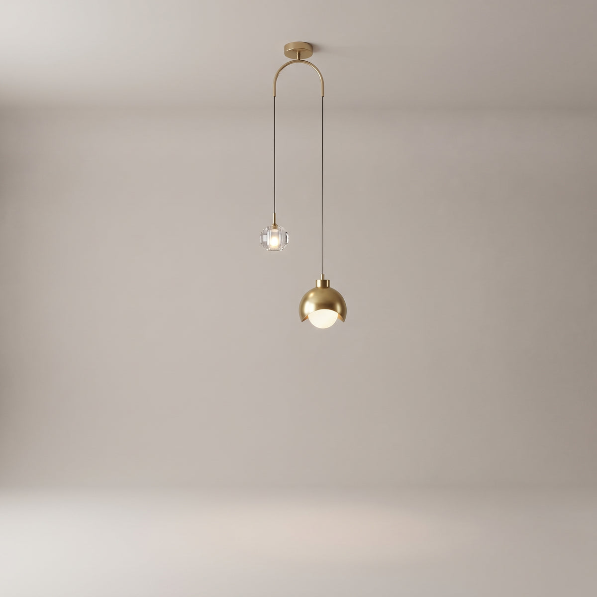 Noor dual pendant light on a plain grey studio background