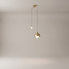 Noor dual pendant light on a plain grey studio background