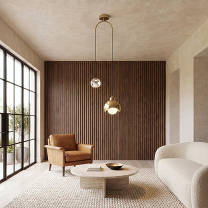 Noor dual pendant light in a living room with a walnut slat wall