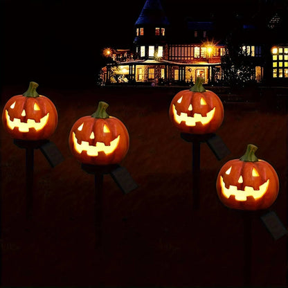 Solar pumpkin pathway lights during daytime