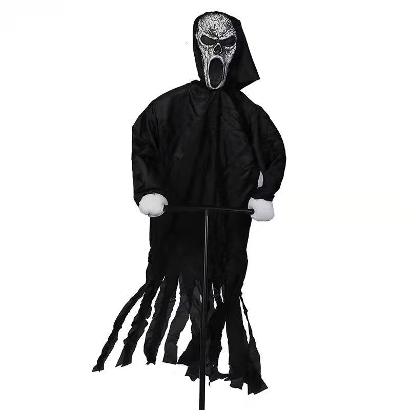 Molded mask and plastic hands on the ghost yard decoration