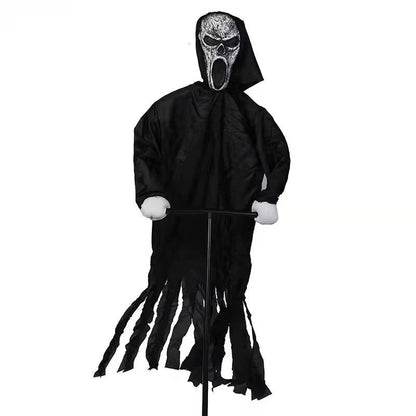 Molded mask and plastic hands on the ghost yard decoration