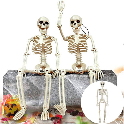 Posable Halloween skeleton decoration hanging from a tree
