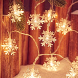 Snowflake light string coiled in its packaging