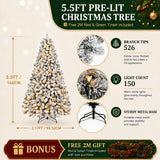 Snowy pine artificial Christmas tree glowing with warm lights