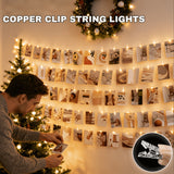 Fairy lights with clips shown as bedroom wall decor