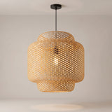Maren woven bamboo pendant on a grey studio background