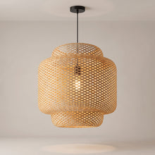 Maren woven bamboo pendant on a grey studio background