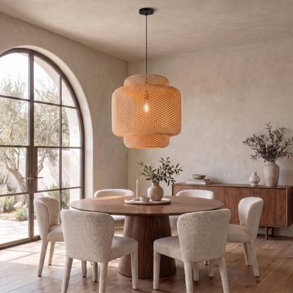 Maren woven bamboo pendant above a round walnut dining table