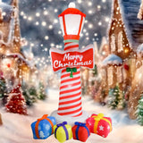 Christmas inflatable lighthouse shown in daylight on a lawn