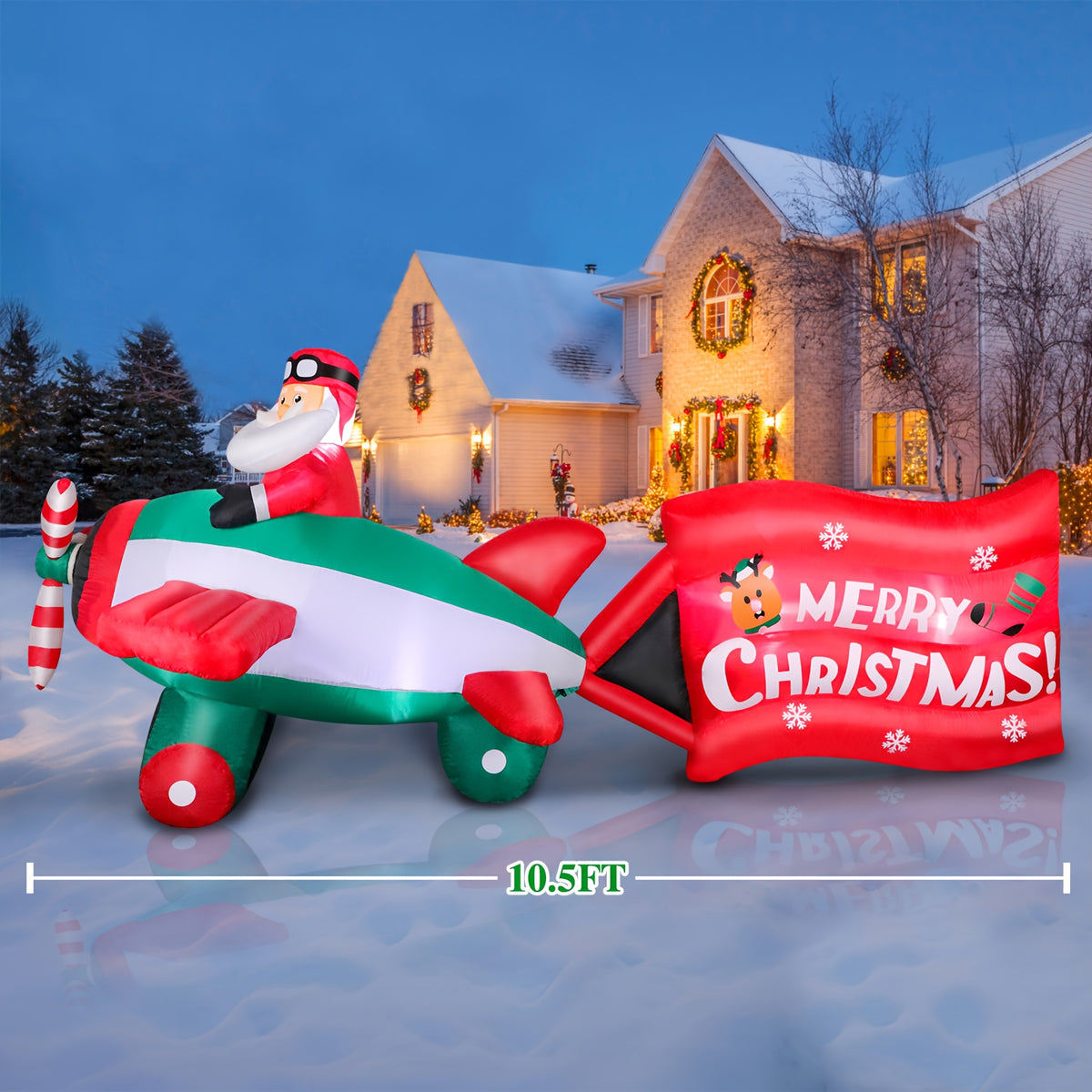 Lighted inflatable Santa Claus flying a helicopter at night