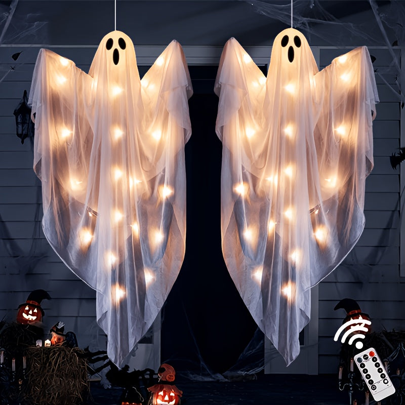Multiple hanging ghost decorations displayed together
