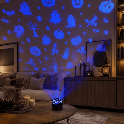 Projection lamp casting ghost-shaped light patterns on a ceiling