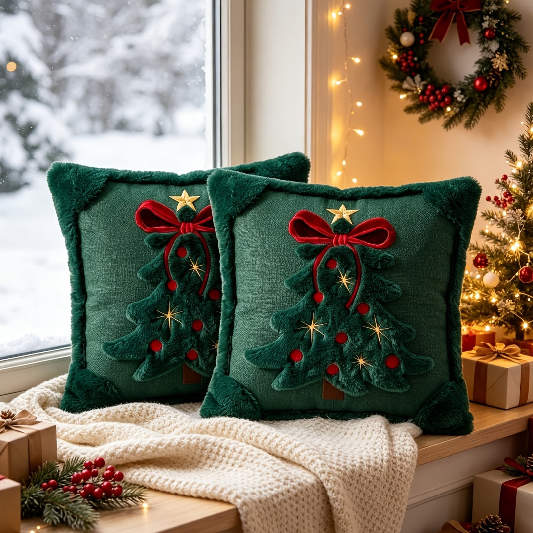 Christmas pillow covers styled on a sofa with a throw blanket