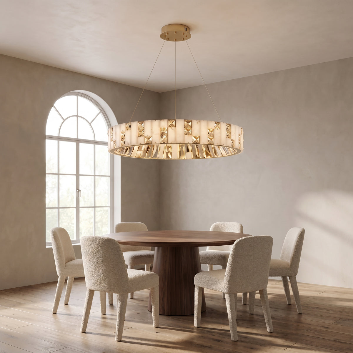Halcyon ring chandelier above a round walnut dining table