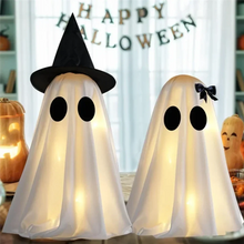 Close-up of a single white ghost figurine from the Halloween set