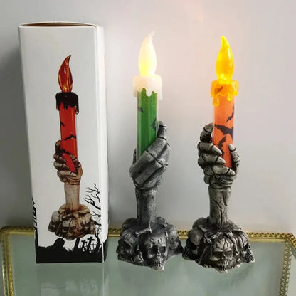 Freestanding skull candle holder on a tabletop