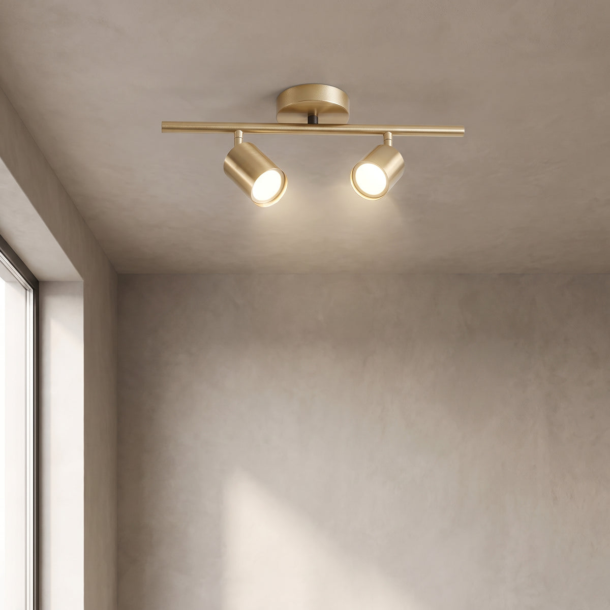 Casimir track light in brushed gold with 2 lights