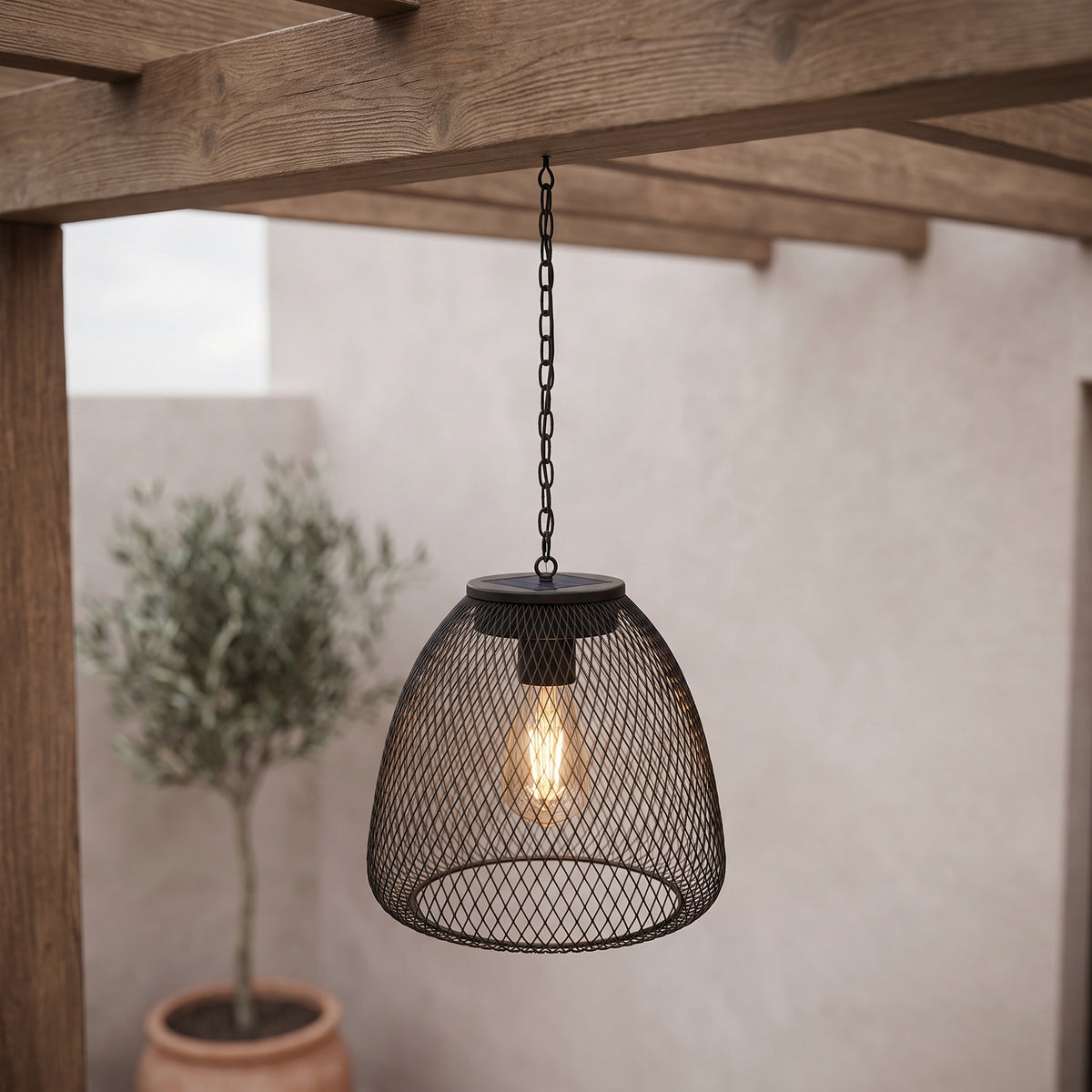 Havana iron mesh variant glowing under a pergola