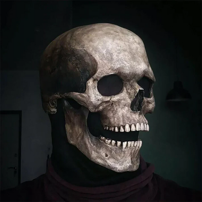 Skull mask detail showing the sculpted teeth and eye sockets