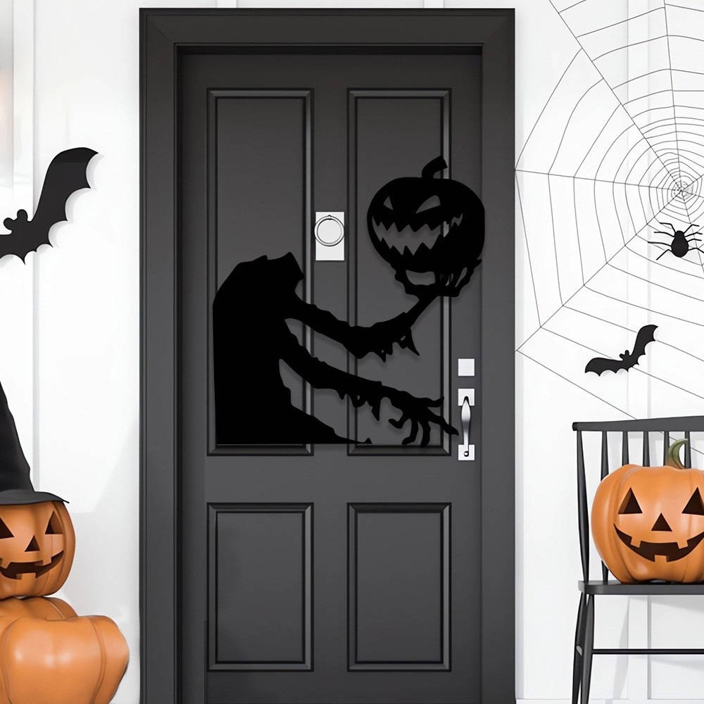 Halloween ghost decoration on a window pane