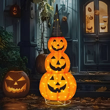 Halloween pumpkin decoration with black hat displayed on a porch