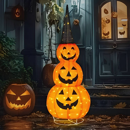 Halloween pumpkin decoration with black hat displayed on a porch