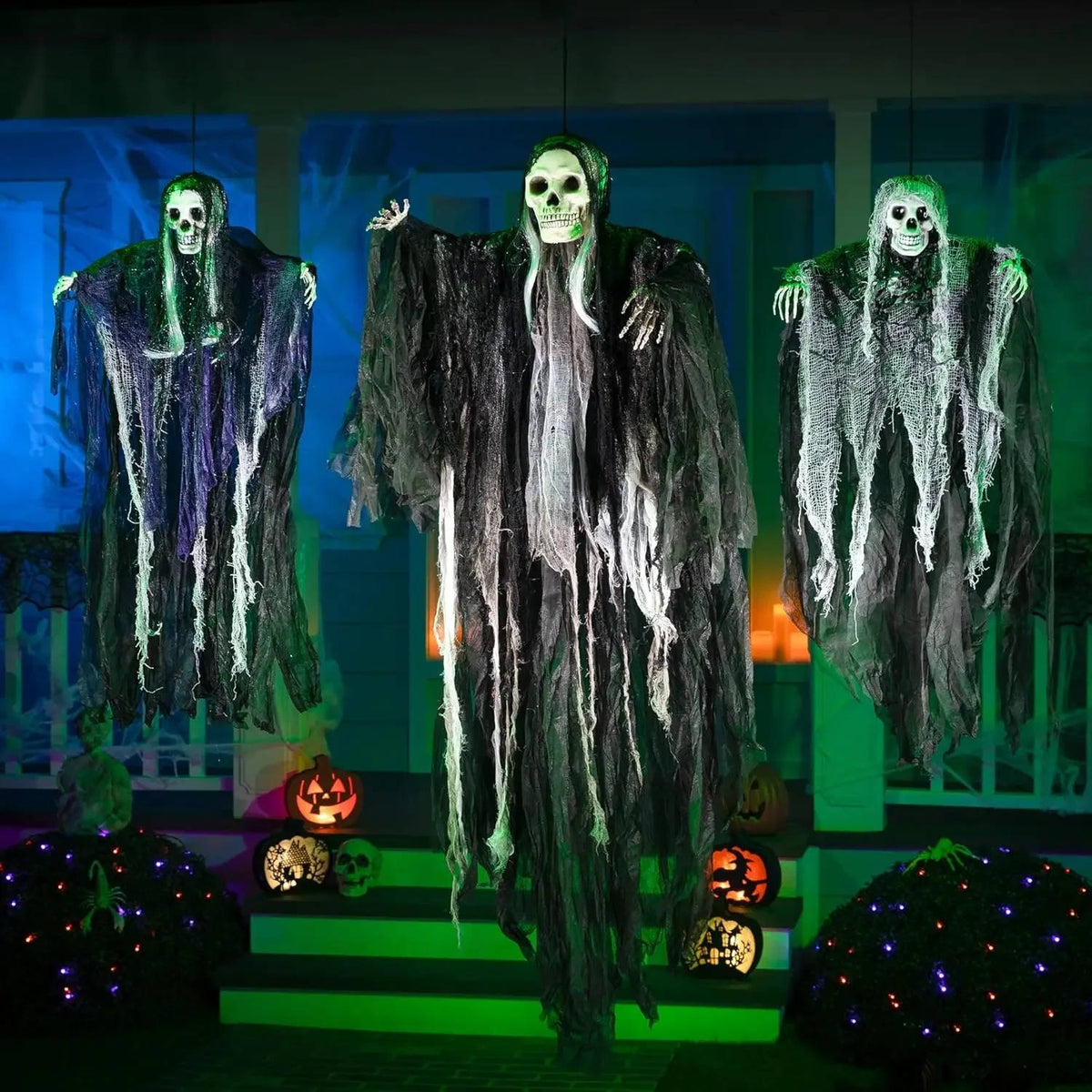 Hanging grim reaper decoration with a skull face and white hair