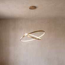 Ivette ring chandelier close-up in metallic gold with 2 rings
