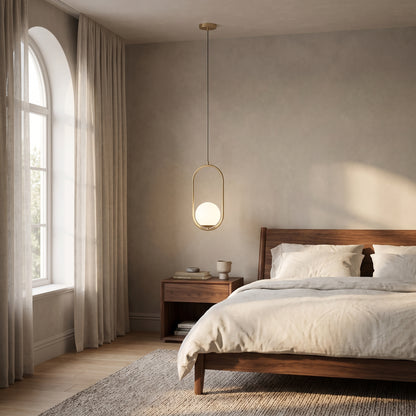 Opaline pendant as a bedside light next to a walnut nightstand