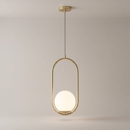 Opaline pendant in brushed gold on a grey studio background