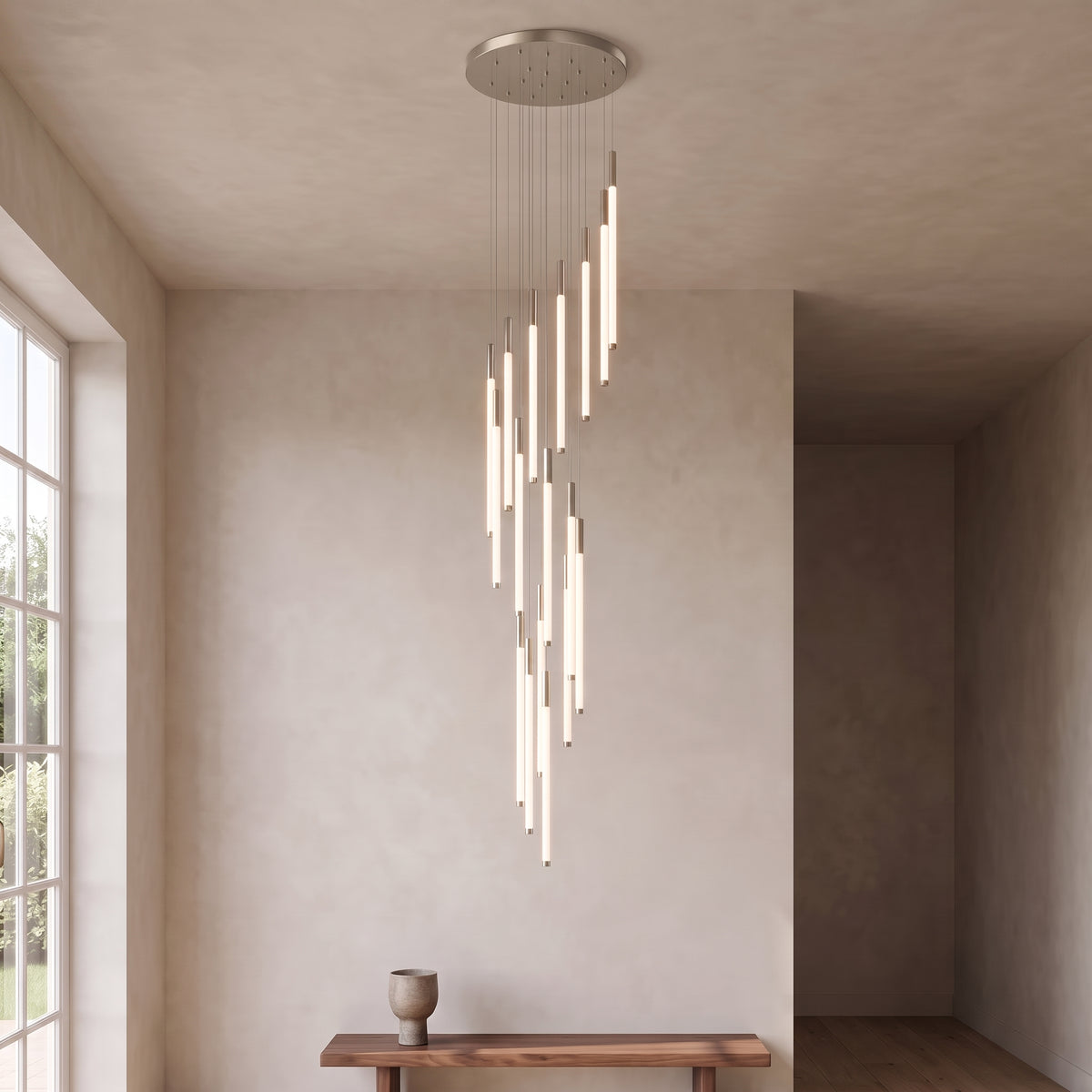 Cascading LED tube chandelier in silver with 18 lights