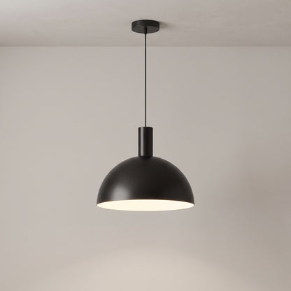 Isolde dome pendant light in matte black on a grey studio background