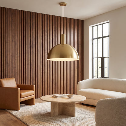 Isolde gold dome pendant light in a living room with a walnut slat wall