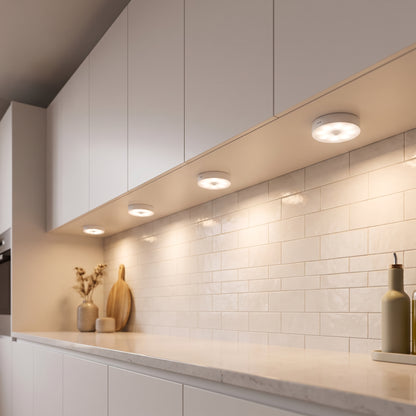 Row of Kumo lights under kitchen cabinets