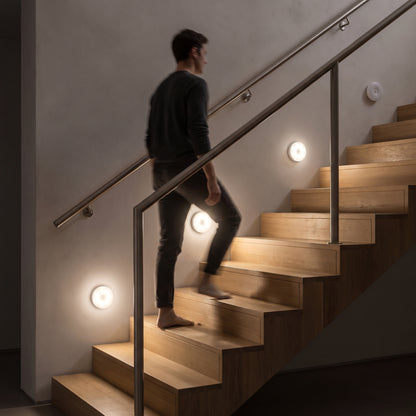 Kumo lights on staircase turning on sequentially as person walks up