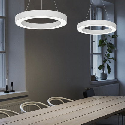 LED ring pendant light mounted above a study desk