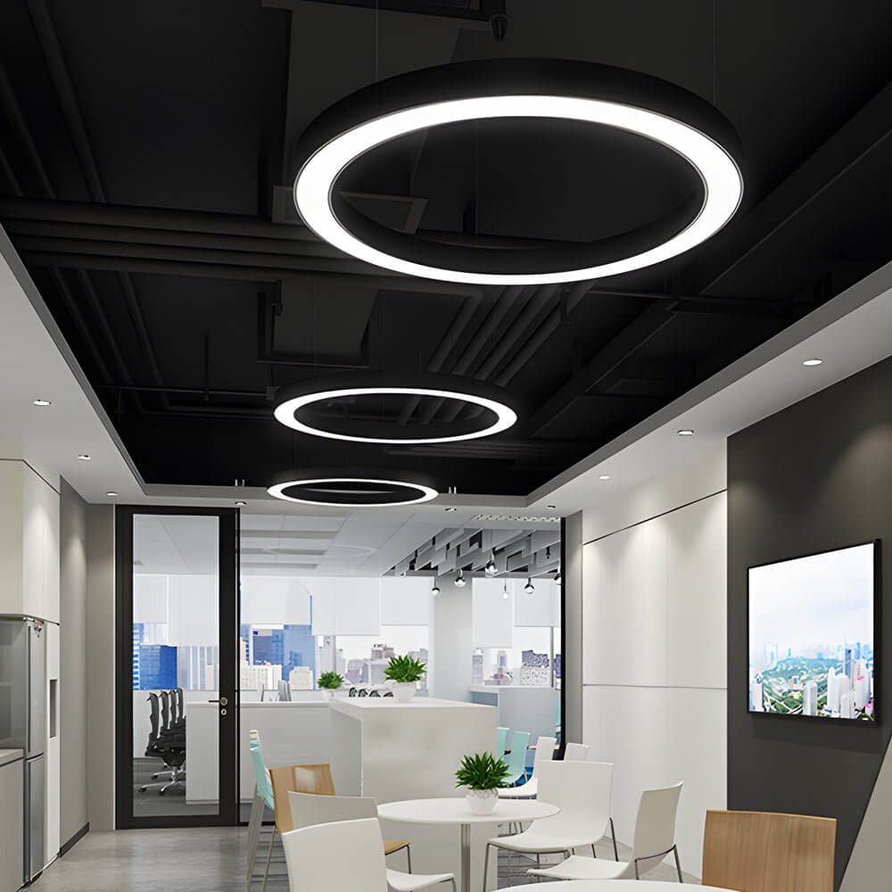 LED ring pendant light with white acrylic shade in an office