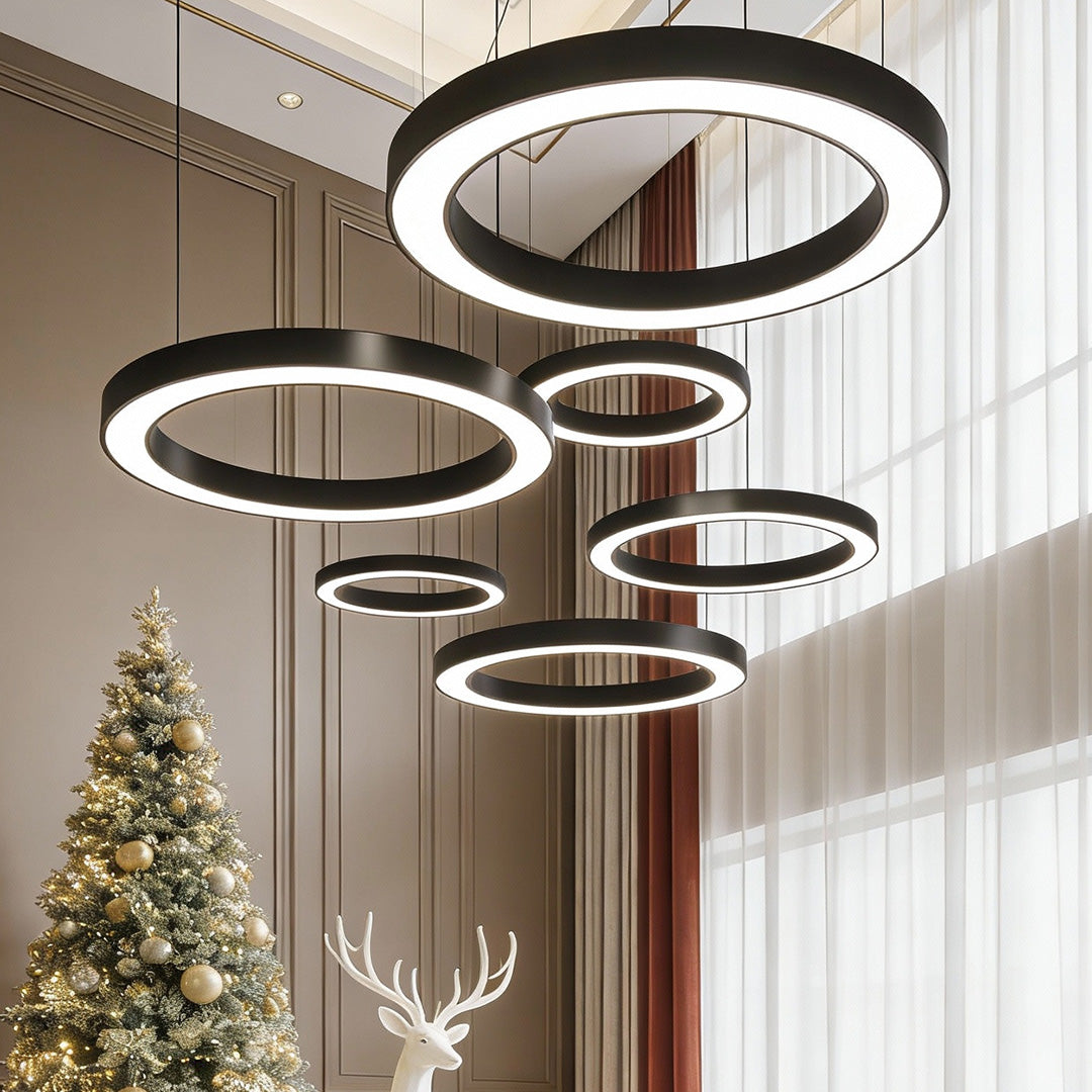 Multiple LED ring pendants installed in a gym