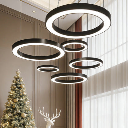Multiple LED ring pendants installed in a gym