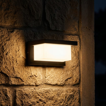 Mamoru - mounted on stone wall at night