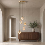 Marble cascading chandelier in an elegant entry hall
