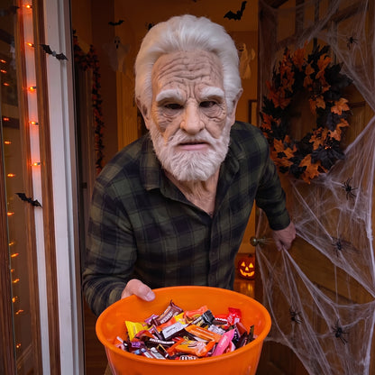 White-Bearded Elder latex mask worn at a Halloween front door