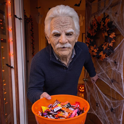 White-Haired Grandpa latex mask worn at a Halloween front door